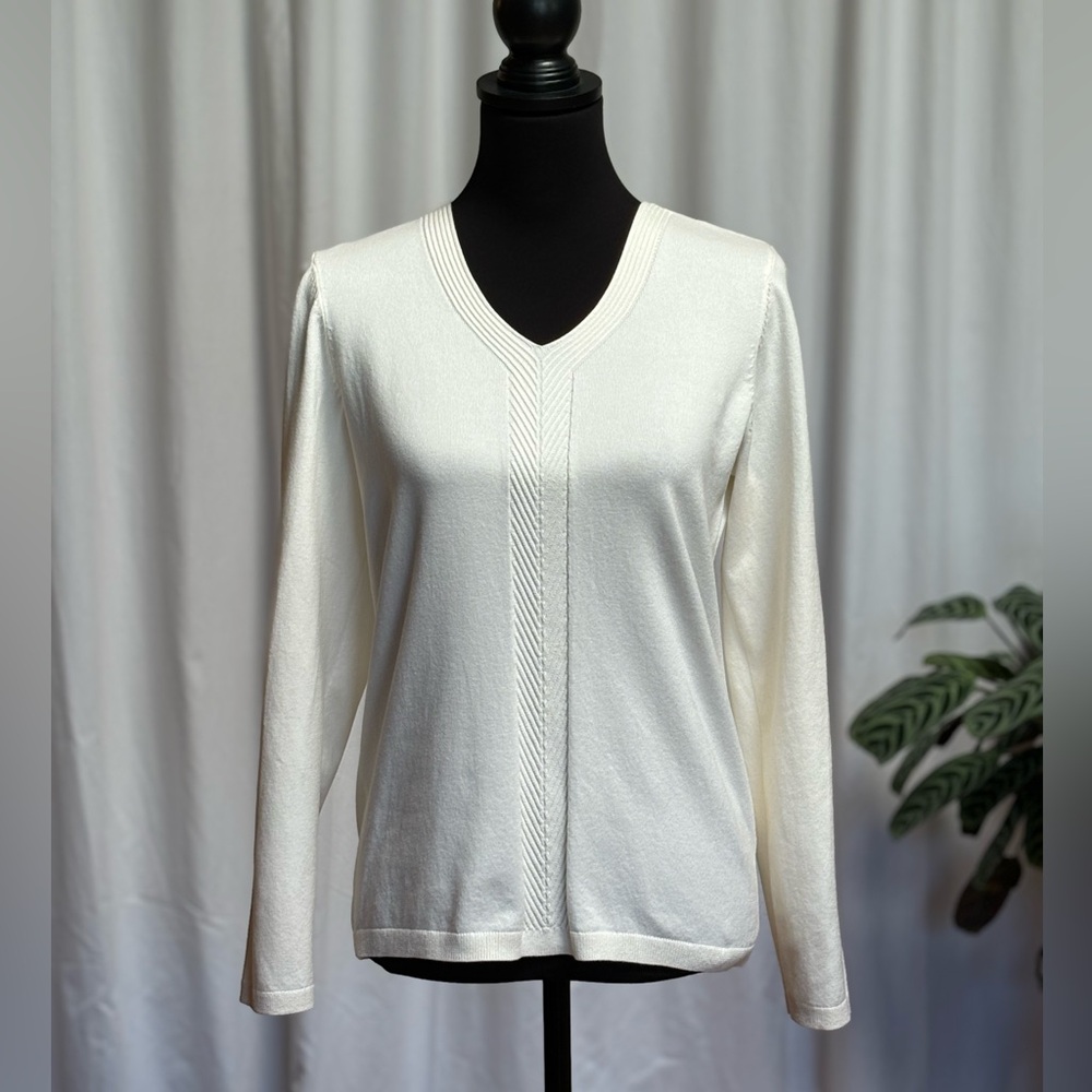 Talbots long sleeve knitted sweater. Cream color size small. V neckline.